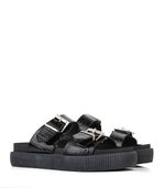 Sandalias-estilo-chunky-con-herrajes-de-cuero-negro.jpg