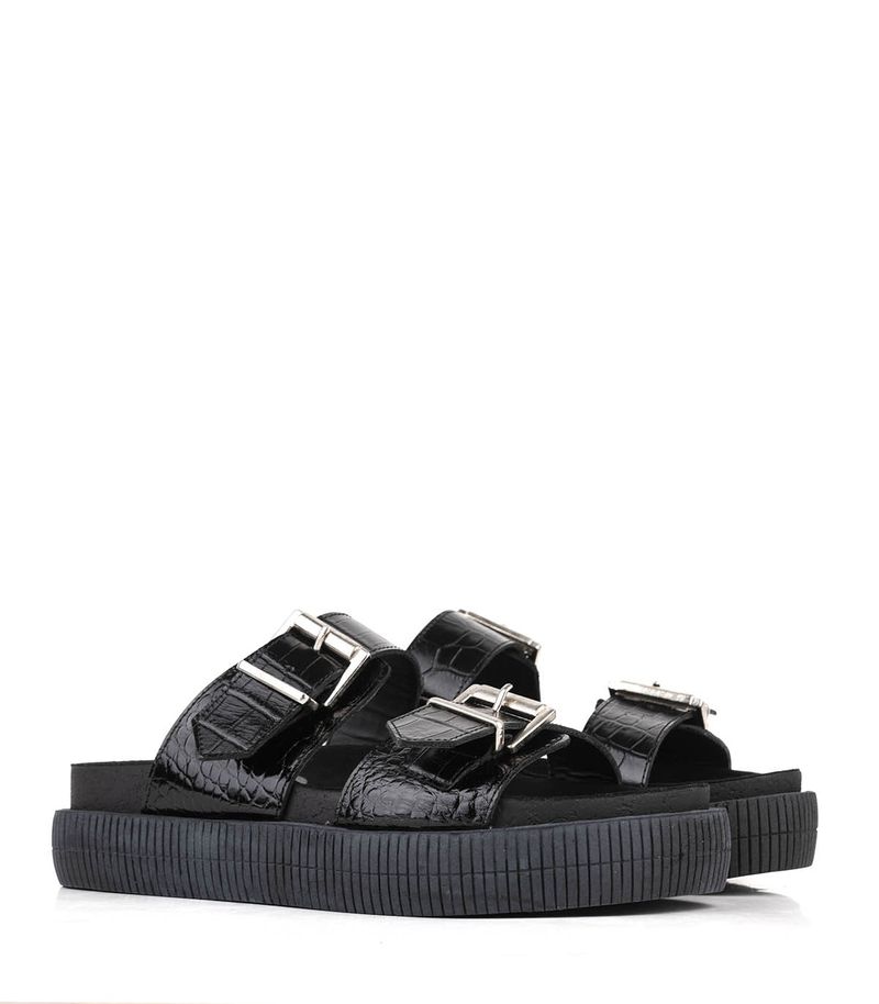 Sandalias-estilo-chunky-con-herrajes-de-cuero-negro.jpg