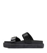 Sandalias-estilo-chunky-con-herrajes-de-cuero-negro.jpg