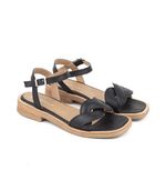 Sandalias-bajas-trenzadas-de-cuero-negro.jpg