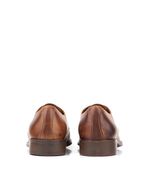 Zapatos-de-vestir-acordonados-de-cuero-en-suela.jpg