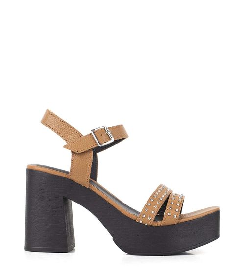 Sandalias altas de cuero con tachas