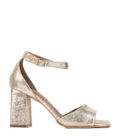 Sandalias altas con pulsera de cuero en oro