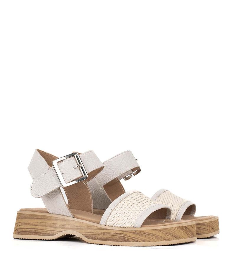 Sandalias-bajas-de-rafia-en-cuero-beige.jpg