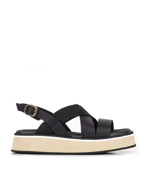 Sandalias bajas de cuero en negro reptil