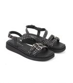 Sandalias-bajas-de-cuero-con-tachas-en-negro.jpg