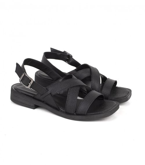 Sandalias baja de cuero con tiras cruzadas en negro