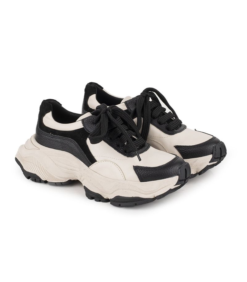 Zapatilla-de-cuero-estilo-chunky-en-negro-y-natural.jpg
