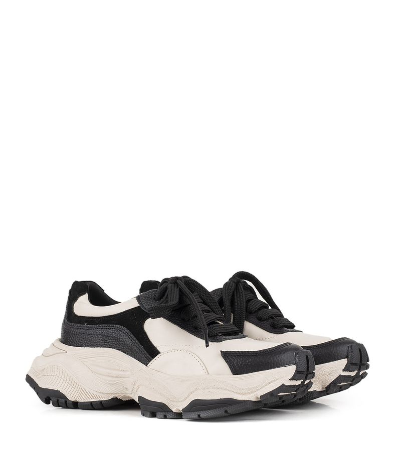 Zapatilla-de-cuero-estilo-chunky-en-negro-y-natural.jpg