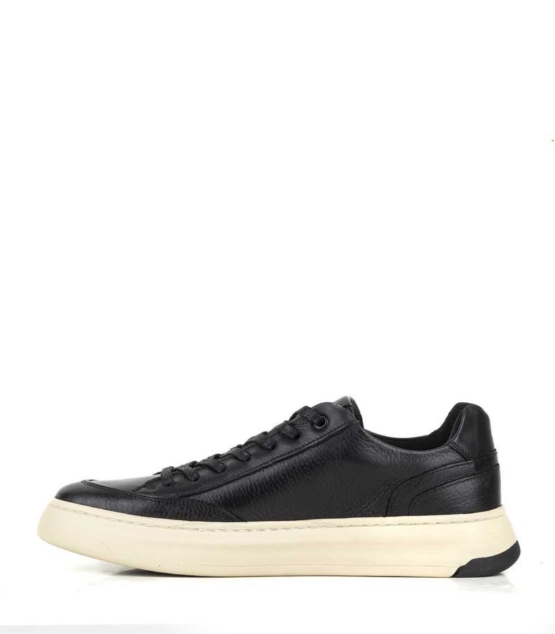Zapatilla-de-cuero-clasica-negra-con-base-beige-cocida.jpg
