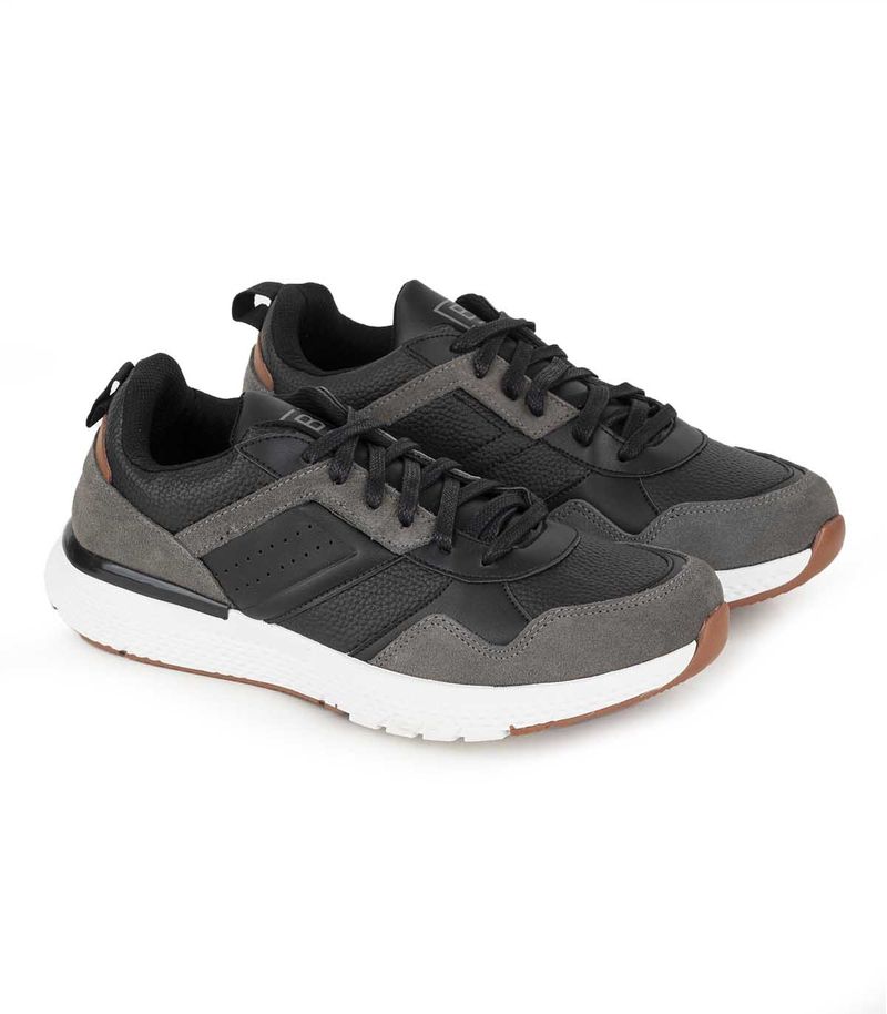 Zapatillas-urbanas-con-recortes-de-simil-en-negro.jpg