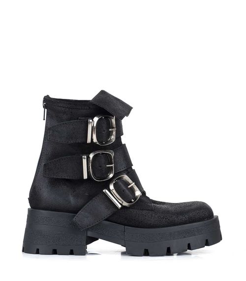 Botas cortas de cuero negro con hebillas y plataforma