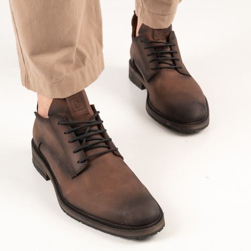 Zapato de cuero engrasado acordonado